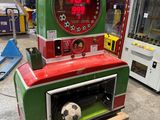 une machine dans laquelle se trouve un ballon de foot