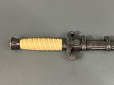 an image of a sword that is on a table