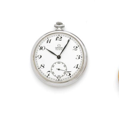 two different types of pocket watches on a white surface