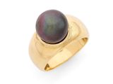 a close up of a ring with a black pearl on it