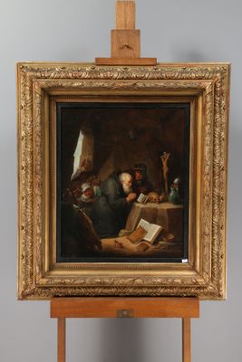 painting of a man reading a book on an easel in a room