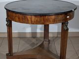 an image of a round table with a marble top