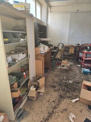 a room with a lot of boxes and boxes on the floor