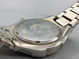 a close up of a wrist watch on a table