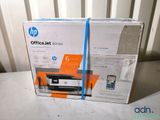 a box with a printer on it sitting on a table