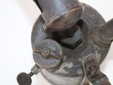 a small metal object that is sitting on a table