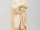 an image of a statue of a woman holding a baby