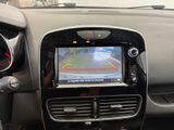 a picture of a car dashboard with a gps device in it