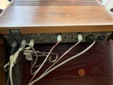 a wooden box with wires and wires attached to it