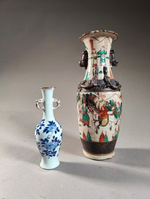 two vases sitting next to each other on a table