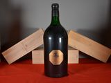 a bottle of wine that is sitting on a table