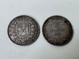 deux pièces d'argent sur lesquelles figure un blason