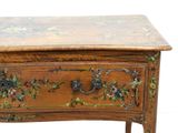 a small wooden table with a drawer on top of it