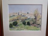 painting of a landscape in a gold frame on a red wall