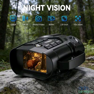 une photo montrant une caméra de vision nocturne posée sur un rocher dans les bois