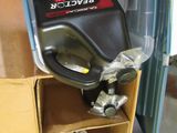 a box with a gas can and a canister on top of it