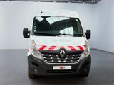 a white van with red stripes parked in a room