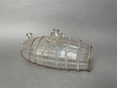 silver plated glass purse with chain handles and a chain strap