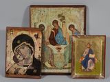 three framed religious paintings of jesus and other religious figures