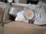 a cardboard box filled with various items in it
