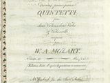 an old book with a page of music written on it