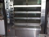 an image of a commercial kitchen with stainless steel appliances