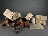 an image of a group of leather items sitting on top of a table