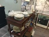 a table with a bunch of plates on top of it