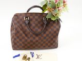 louis vuitton damier speedy bag with flowers in it