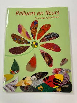 the book features an image of a flower made out of paper