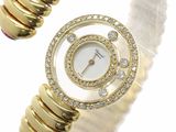 an image of a close up of a wrist watch with diamonds on it