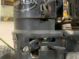 a close up of a motor on the ground