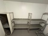 a room with shelves and shelves in it that are empty