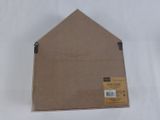 an open cardboard box with a sticker on the side of it