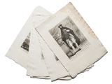a pile of old papers that are stacked on top of each other
