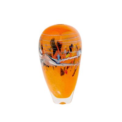 a glass vase with a picture of a beach scene on it