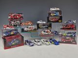 a lot of toy cars that are in a display case