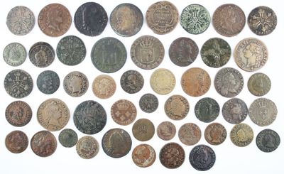 an image of a pile of old coins sitting on top of a white surface