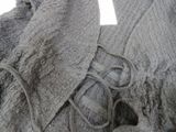 a close up of a pair of shoes on a blanket