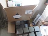 a box full of boxes sitting on the floor next to a pile of boxes