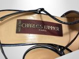 charles kremmer black leather heels with a leather label on the heel