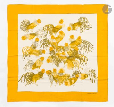 a close up of a yellow and white scarf with roosters on it