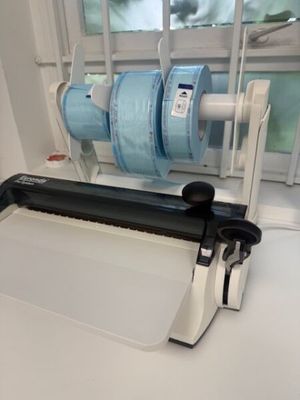 a machine that is sitting on a table in front of a window