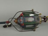 a toy helicopter that is sitting on top of a table