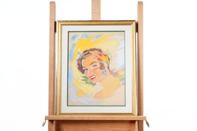 a picture of a painting on a easel with a picture of a woman