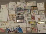 a lot of stamps and envelopes on a table