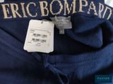 a close up of a shirt with a tag on it