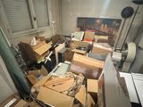 a room with a lot of boxes and boxes on the floor