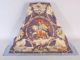 a purple and blue blanket with a picture of a man riding a horse