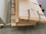 boxes are stacked on top of each other in a warehouse